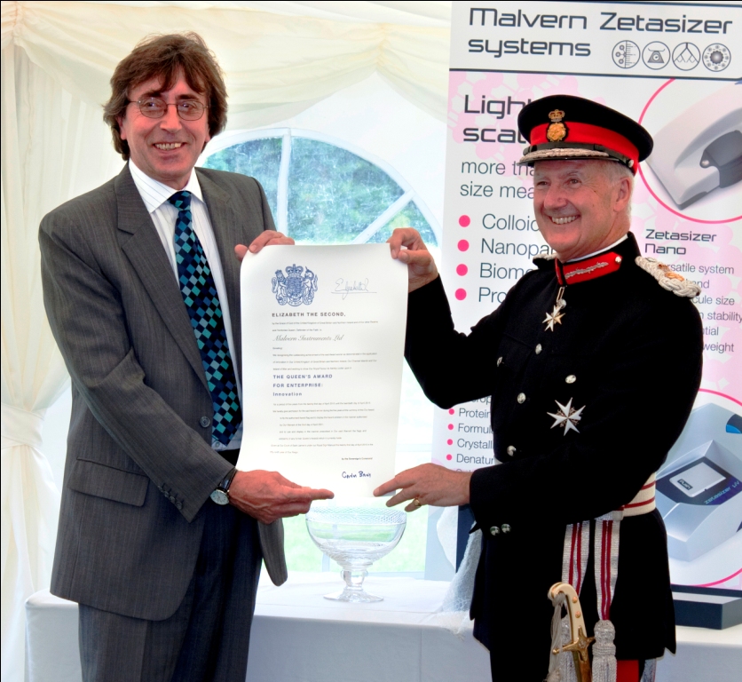 Paul Walker (left) Managing Director of Malvern Instruments receives the 2010 Queen’s Award for Enterprise from the Lord Lieutenant of Worcestershire, Sir Michael Brinton, on 3 September 2010